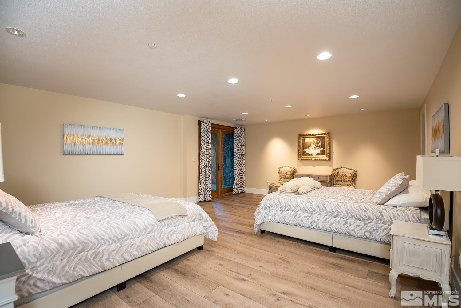 281 Fredricksburg Road Gardnerville, NV 89460 - Photo 27 of 38 a bedroom with a bed and a night stand