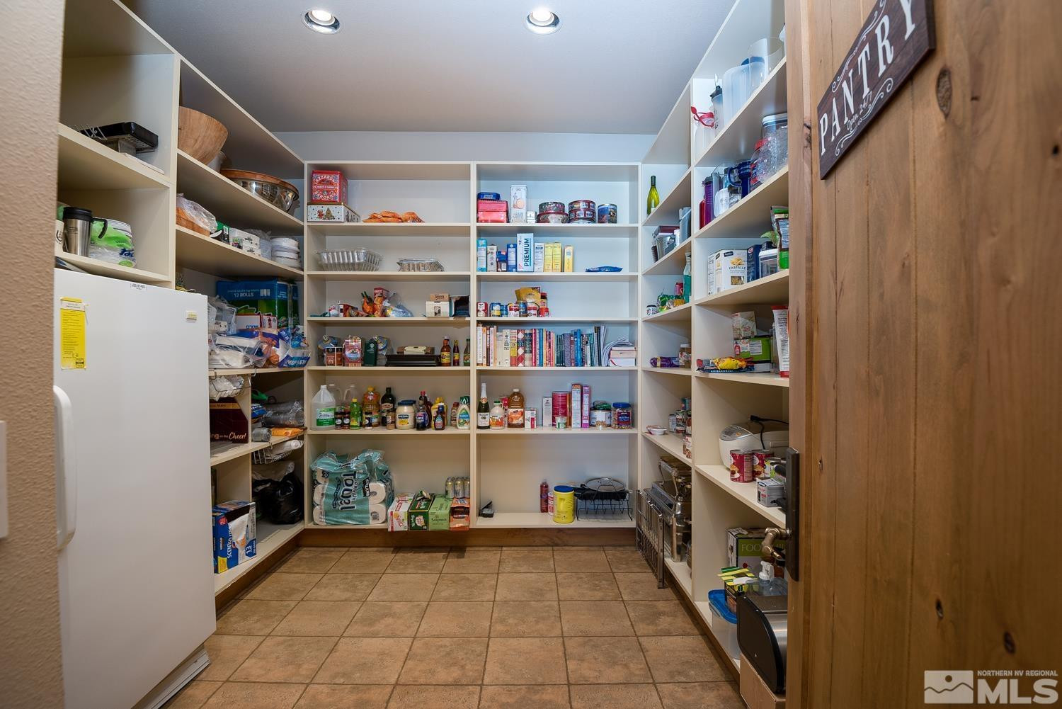 281 Fredricksburg Road Gardnerville, NV 89460 - Photo 37 of 38 a view of room with shelves