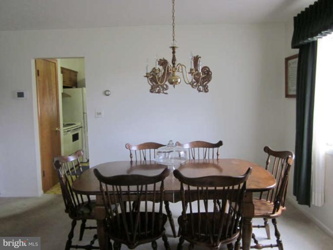 419 Reckord Road Fallston, MD 21047 - Photo 14 of 28 a view of a dining room that has a table and chairs