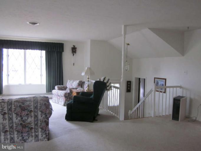 419 Reckord Road Fallston, MD 21047 - Photo 28 of 28 a living room with furniture and a large window