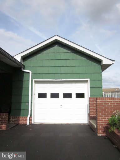 419 Reckord Road Fallston, MD 21047 - Photo 5 of 28 a black and white building with a small yard