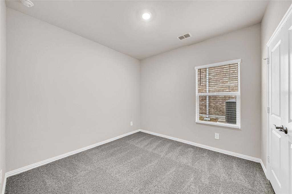 417 Martell Road Lowry Crossing, TX 75069 - Photo 23 of 29 an empty room with a window