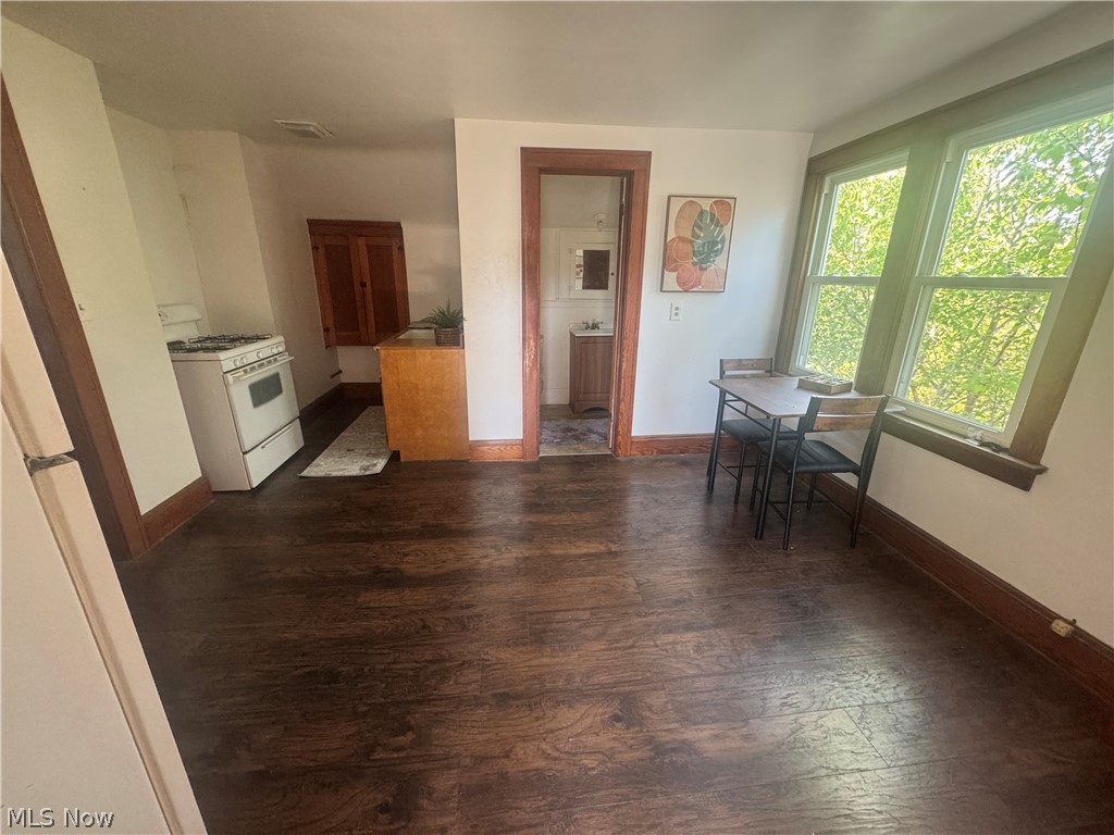 18309 Edgerton Road Cleveland, OH 44119 - Photo 12 of 19 Dark wood-finish flooring throughout