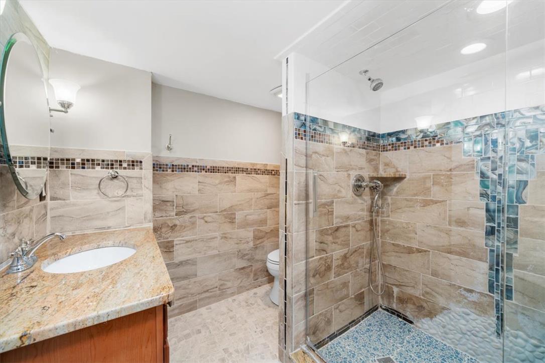 988 Hoch Road Danielsville, PA 18038 - Photo 17 of 29 A well-appointed bathroom featuring a spacious walk-in shower and elegant vanity.