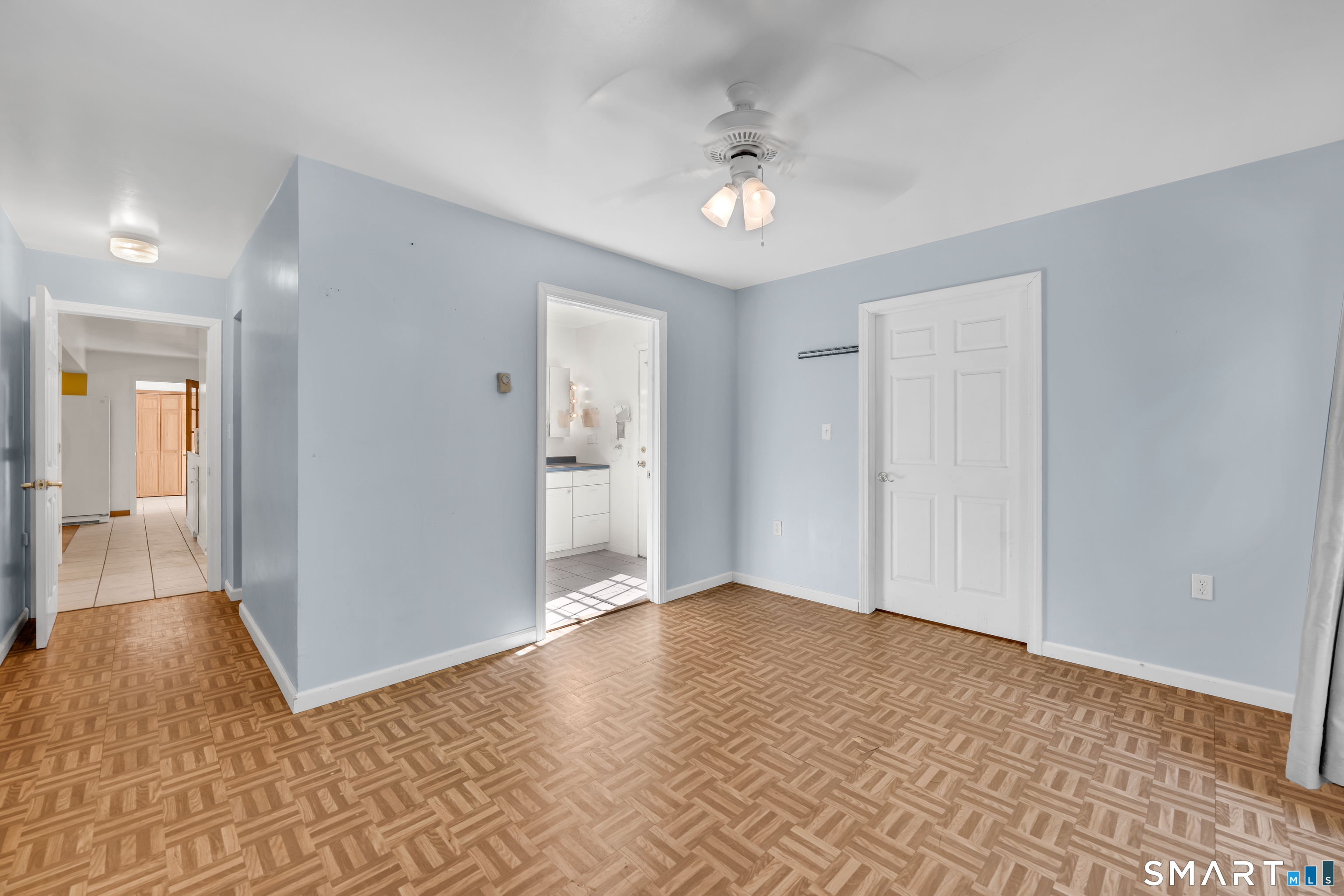 315 West Hill Road Torrington, CT 06790 - Photo 12 of 40 a view of livingroom with hardwood floor and a ceiling fan