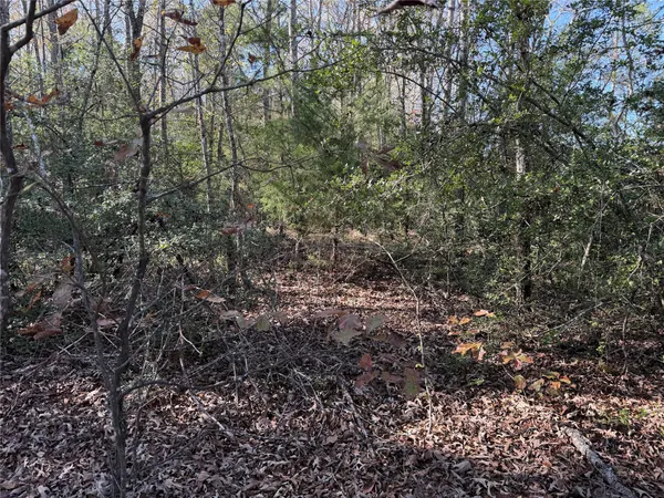 a street sign sitting on a road