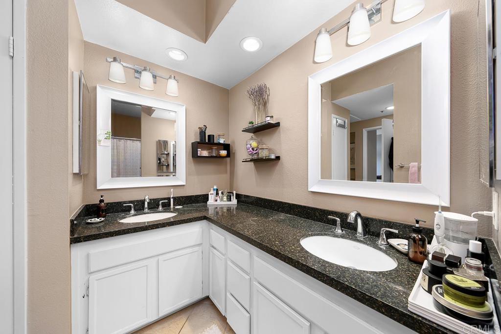 3666 Third Avenue, Unit 202 San Diego, CA 92103 - Photo 13 of 31 a bathroom with a sink and a mirror