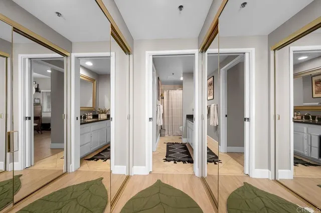 a bedroom with a bed and a view of bedroom