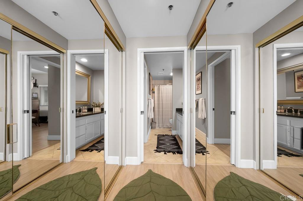 3666 Third Avenue, Unit 202 San Diego, CA 92103 - Photo 18 of 31 a bedroom with a bed and a view of bedroom