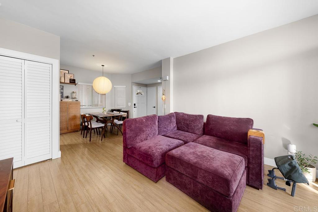 3666 Third Avenue, Unit 202 San Diego, CA 92103 - Photo 3 of 31 a living room with furniture and a wooden floor