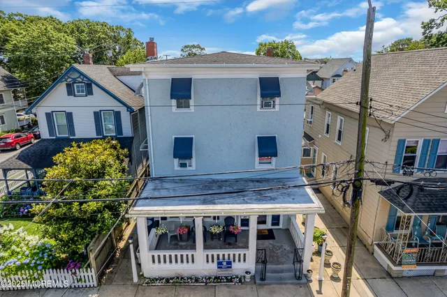 an aerial view of a city with lots of residential buildings