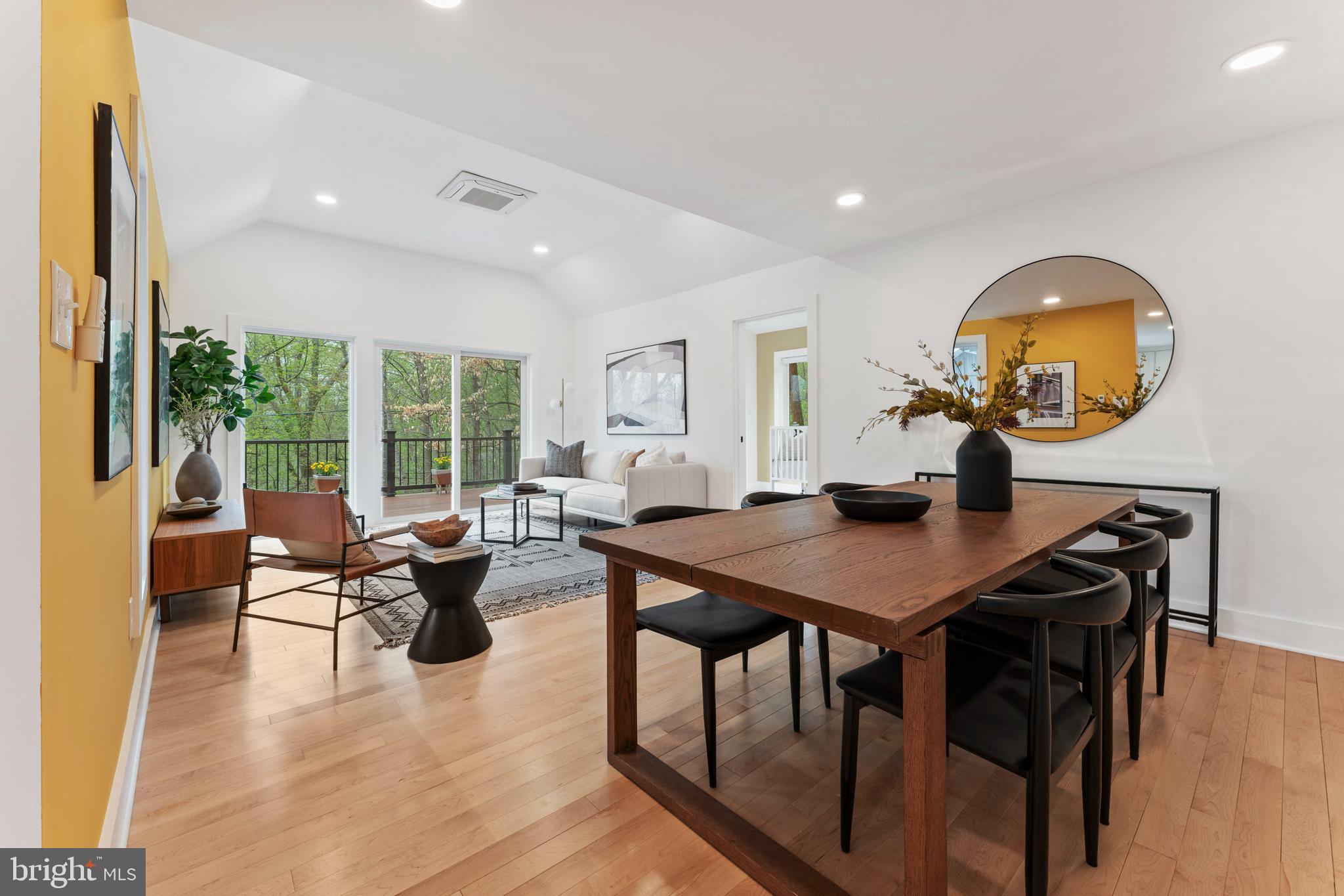 6522 Walhonding Road Bethesda, MD 20816 - Photo 14 of 76 a living room with furniture a rug and a large window