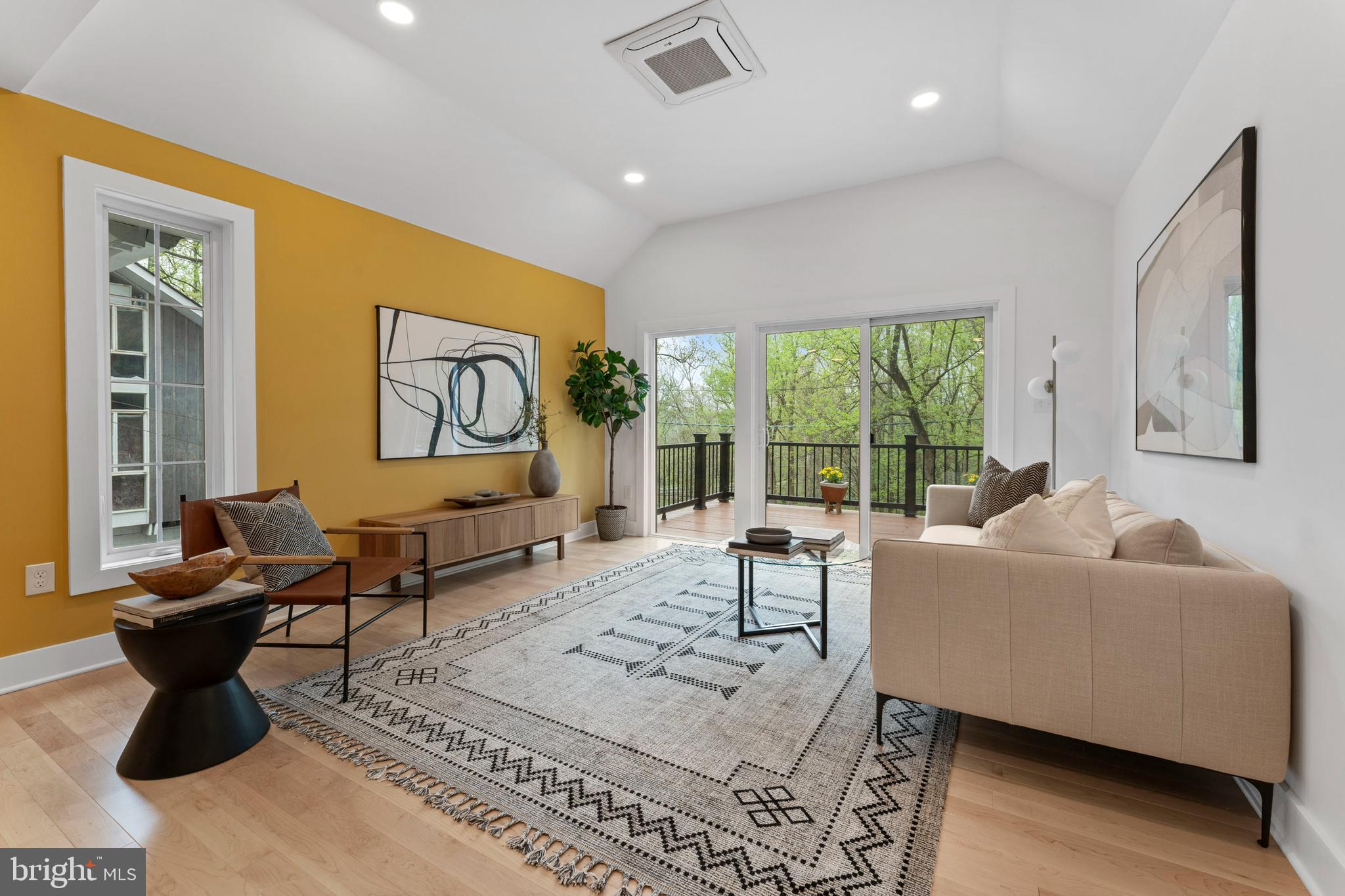 6522 Walhonding Road Bethesda, MD 20816 - Photo 28 of 76 a living room with fireplace furniture and a large window