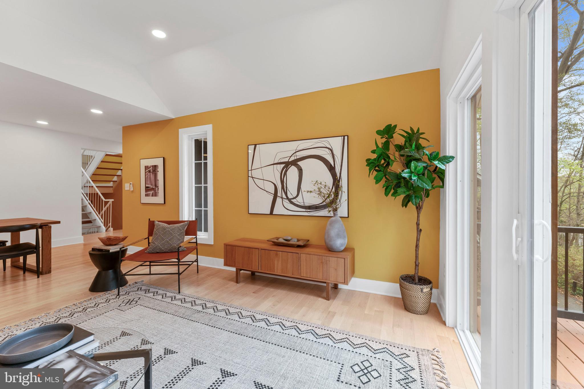 6522 Walhonding Road Bethesda, MD 20816 - Photo 29 of 76 a bedroom with furniture and a potted plant
