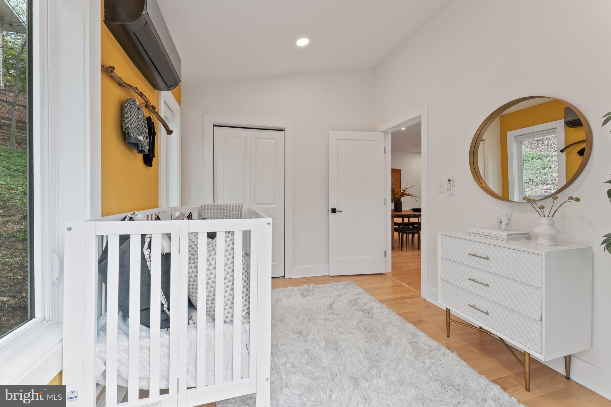 6522 Walhonding Road Bethesda, MD 20816 - Photo 31 of 76 a view of a entryway door with wooden floor