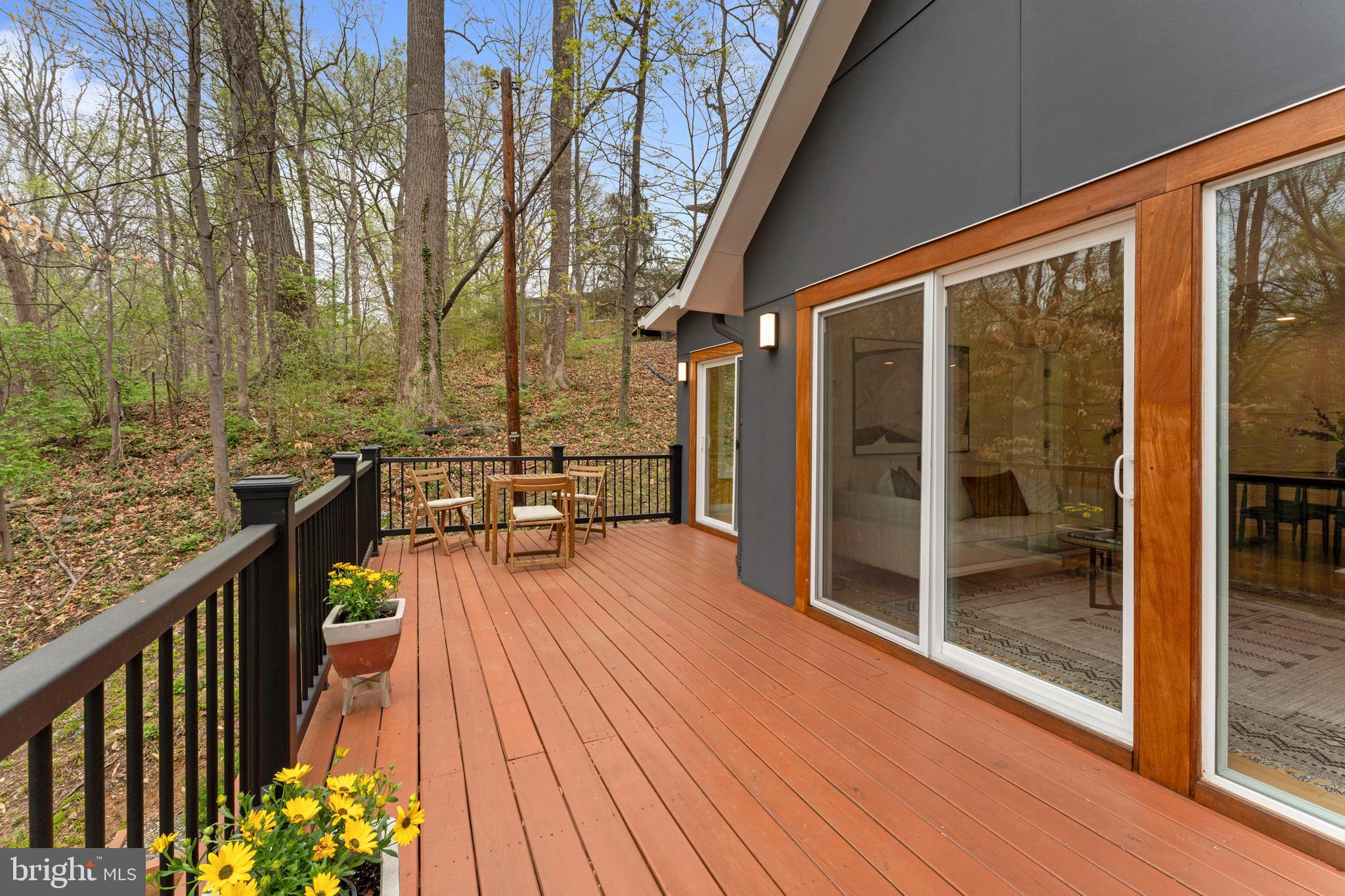 6522 Walhonding Road Bethesda, MD 20816 - Photo 32 of 76 a balcony with wooden floor