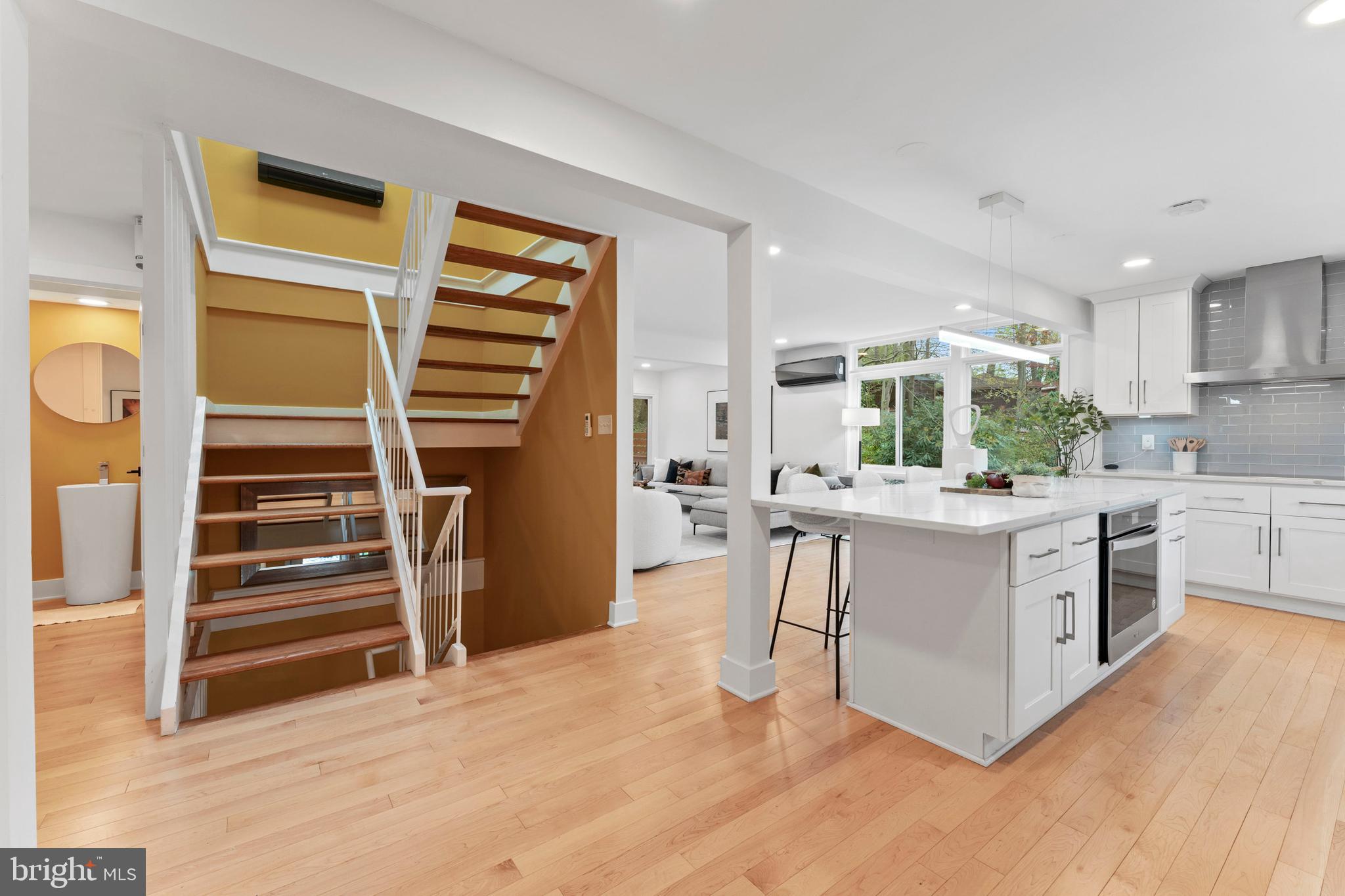 6522 Walhonding Road Bethesda, MD 20816 - Photo 34 of 76 a kitchen with stainless steel appliances a stove and a refrigerator