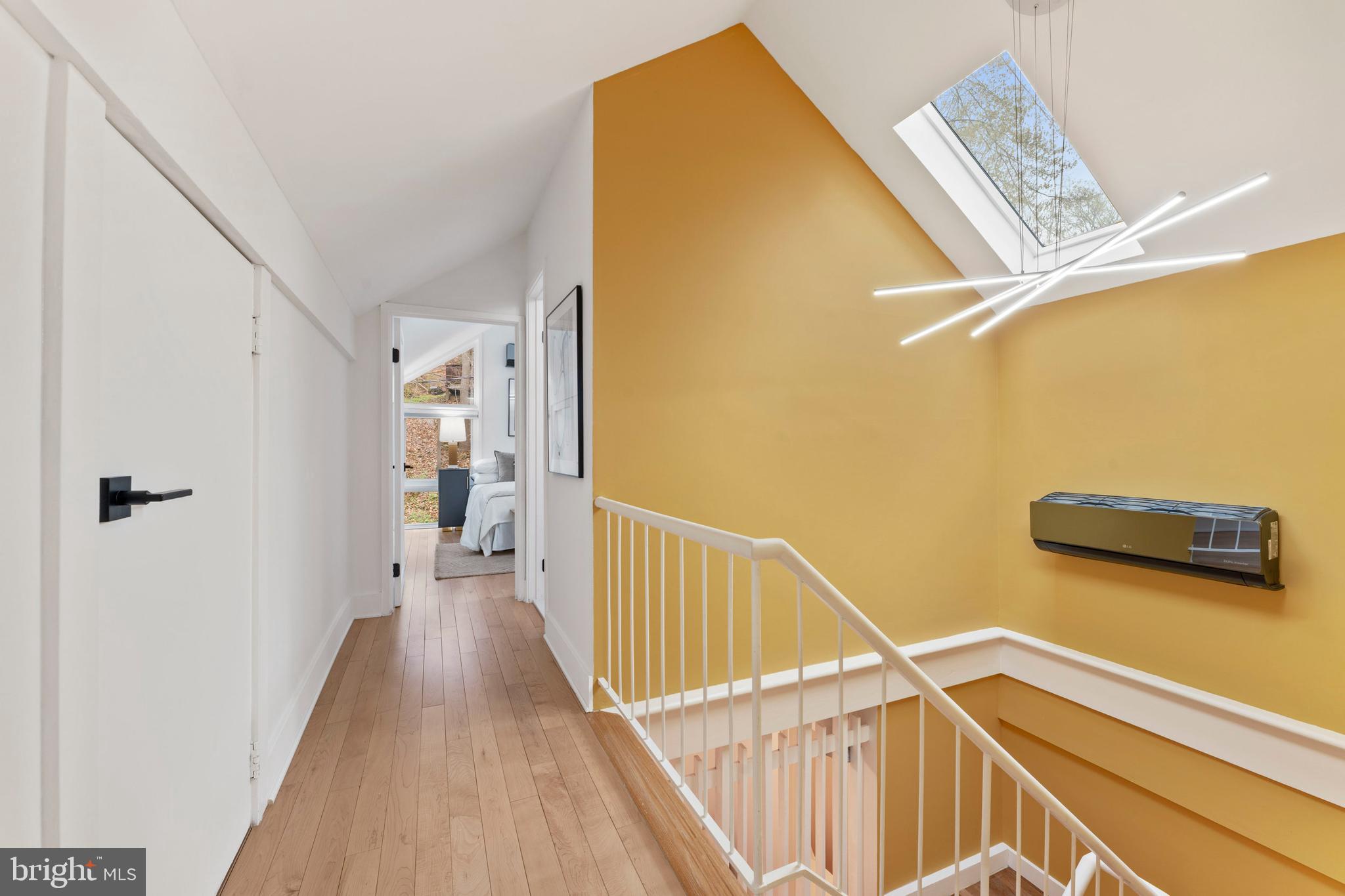 6522 Walhonding Road Bethesda, MD 20816 - Photo 35 of 76 a view of a hallway with staircase