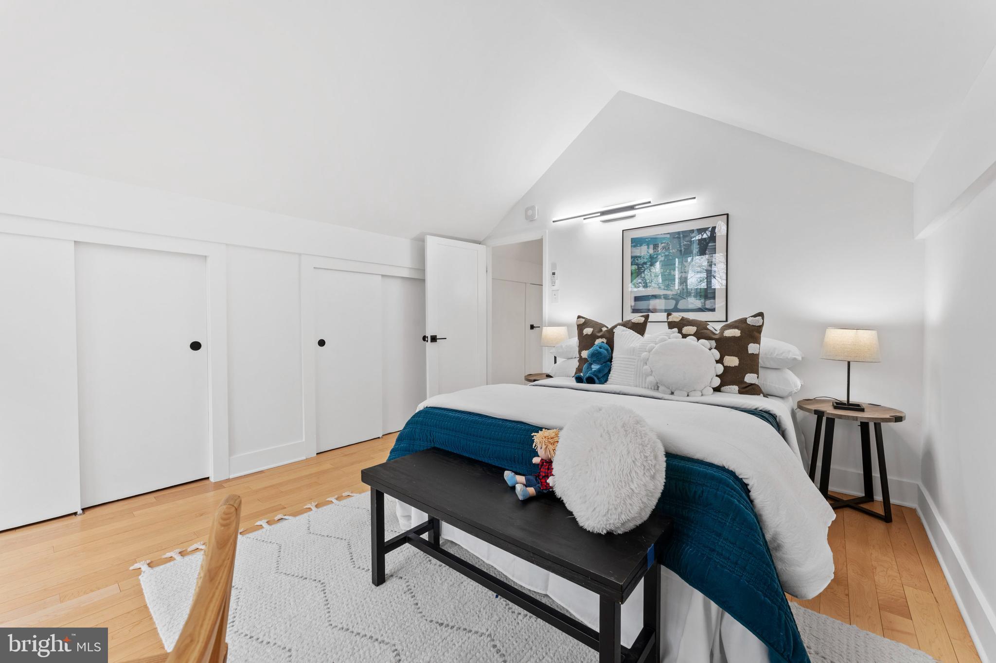 6522 Walhonding Road Bethesda, MD 20816 - Photo 38 of 76 a bed room with a bed mirror and a night stand