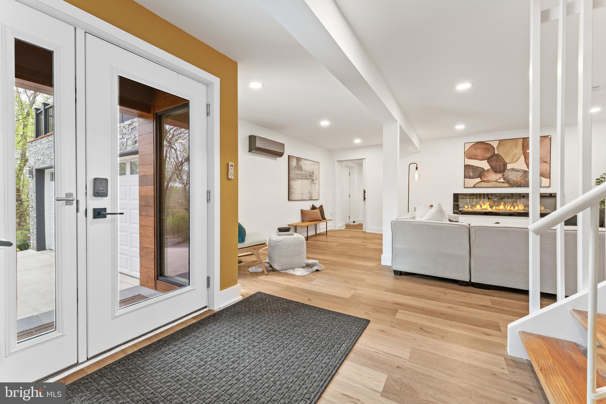 6522 Walhonding Road Bethesda, MD 20816 - Photo 45 of 76 a living room with furniture and a wooden floor