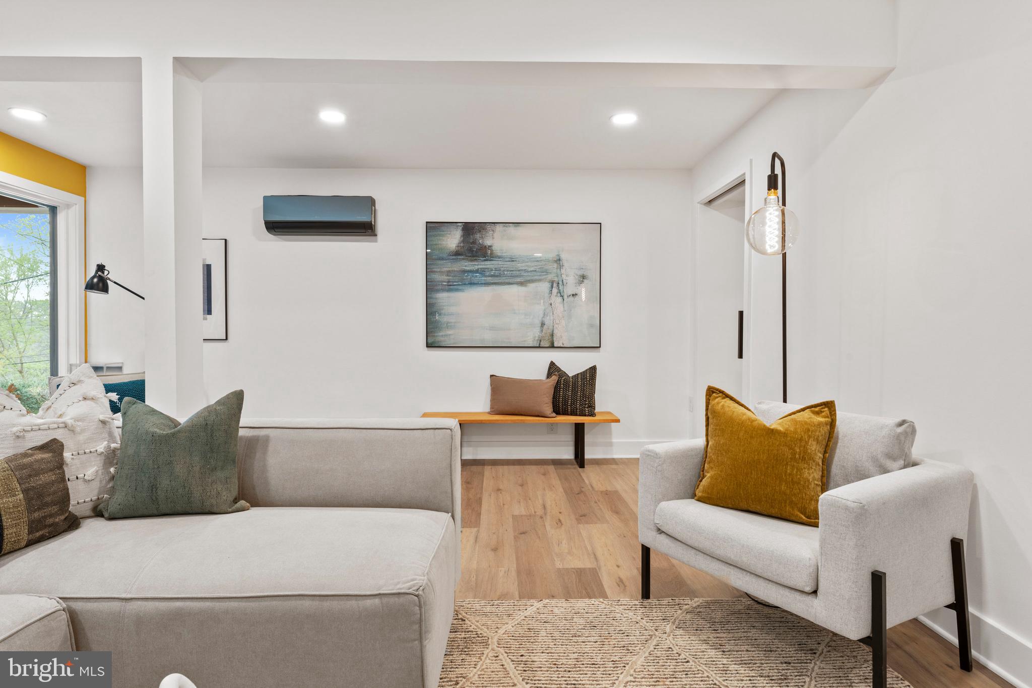 6522 Walhonding Road Bethesda, MD 20816 - Photo 52 of 76 a living room with furniture and a couch