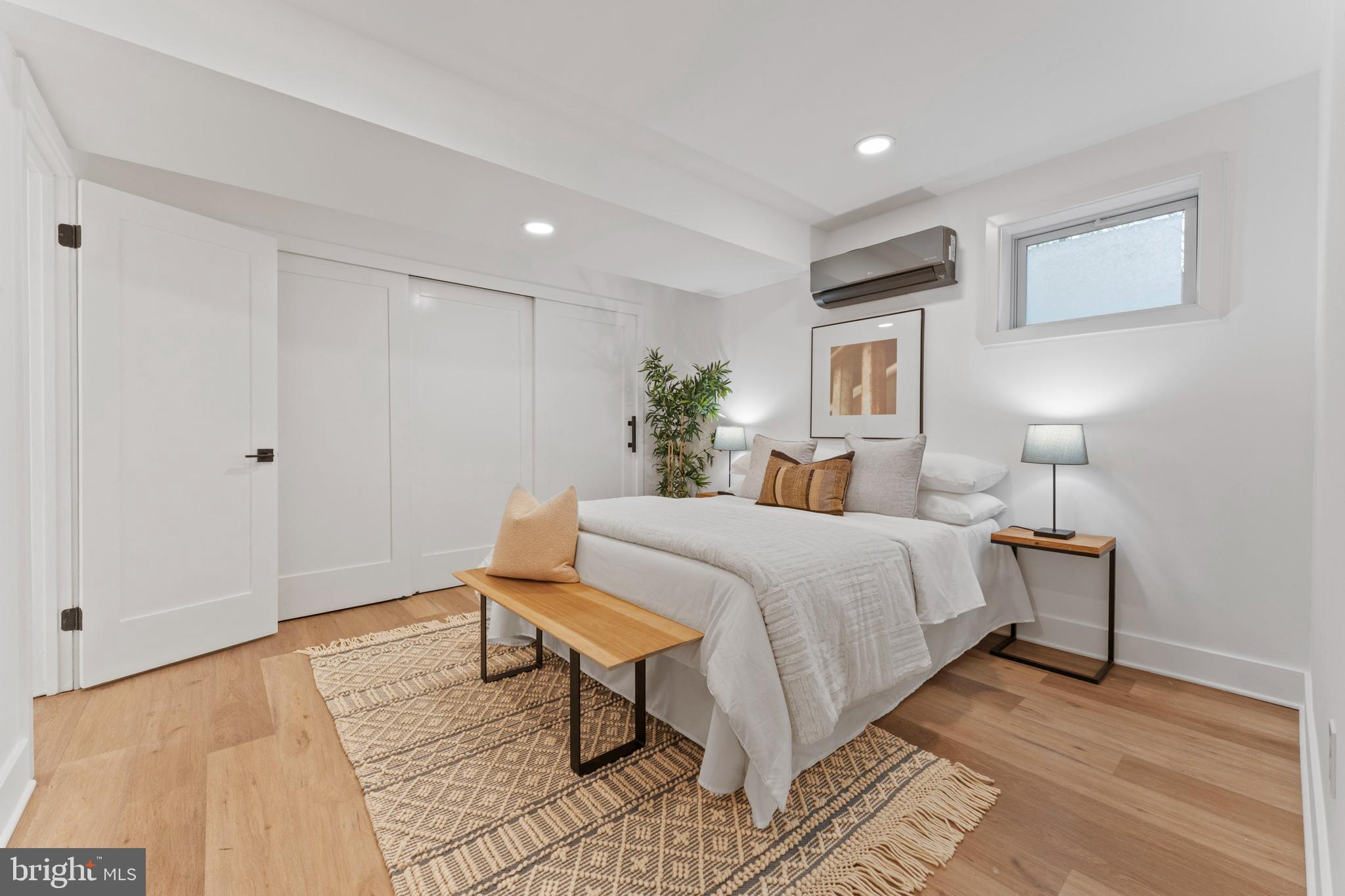 6522 Walhonding Road Bethesda, MD 20816 - Photo 53 of 76 a bed room with a bed and a night stand