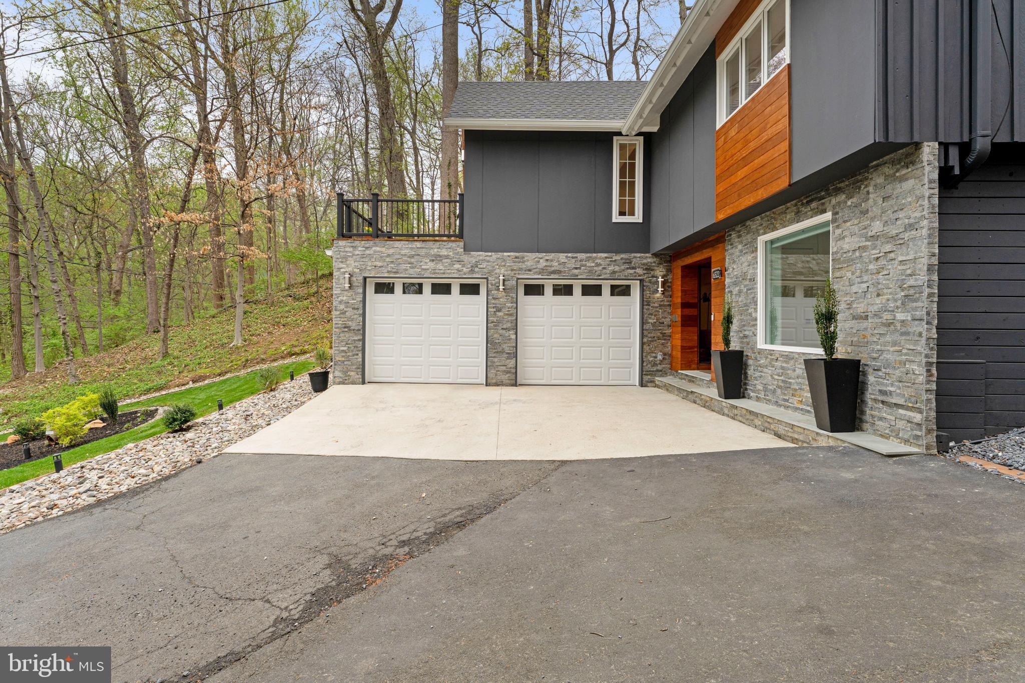 6522 Walhonding Road Bethesda, MD 20816 - Photo 66 of 76 a view of a house with a outdoor space