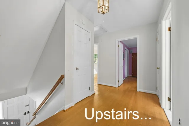 a bedroom with a bed dresser and a window