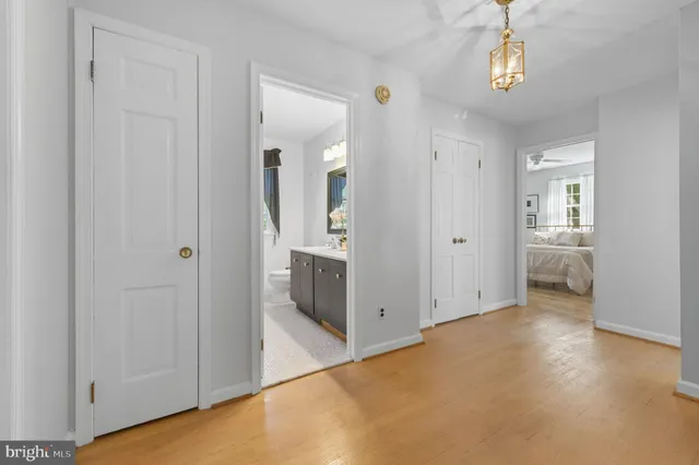 a bedroom with a bed and closet