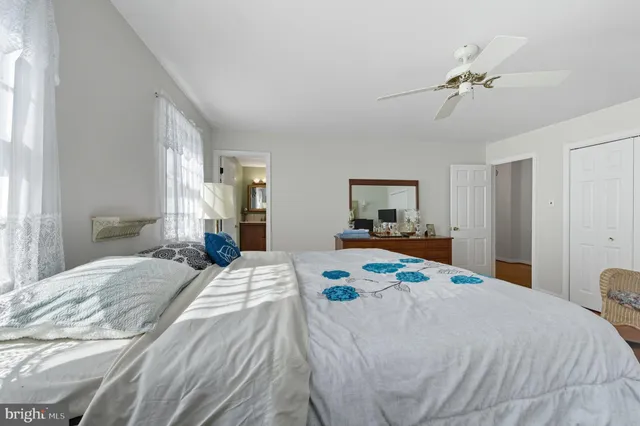 a view of a swimming pool with a yard