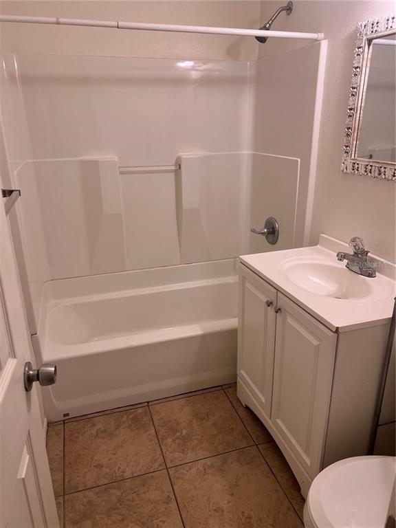 1240 Highland Street Sarasota, FL 34234 - Photo 8 of 19 a bathroom with a sink and a toilet