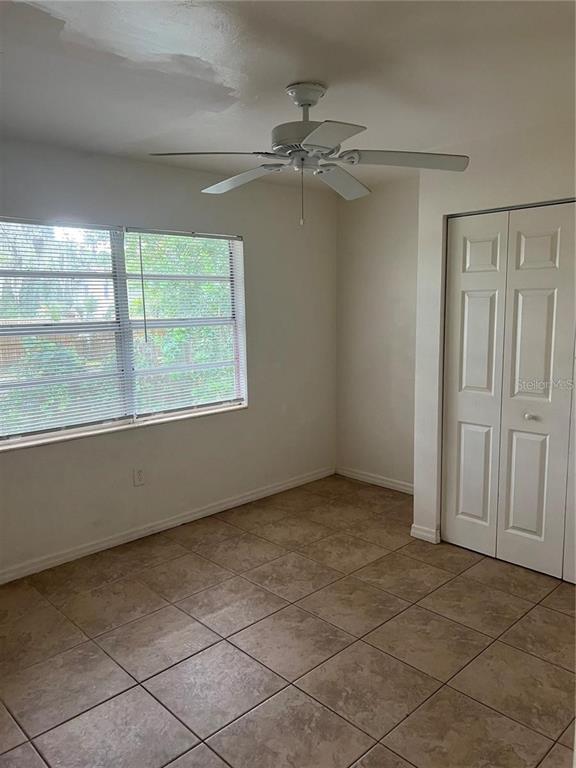 1240 Highland Street Sarasota, FL 34234 - Photo 9 of 19 a view of an empty room with a window