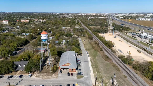 an aerial view of a houses with a outdoor space