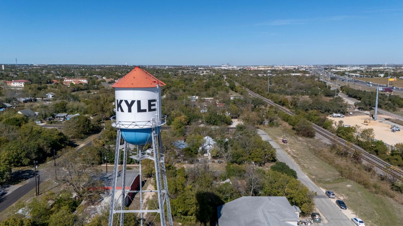 313 North Front Street Kyle, TX 78640 - Photo 17 of 28 an aerial view of a houses with a outdoor space
