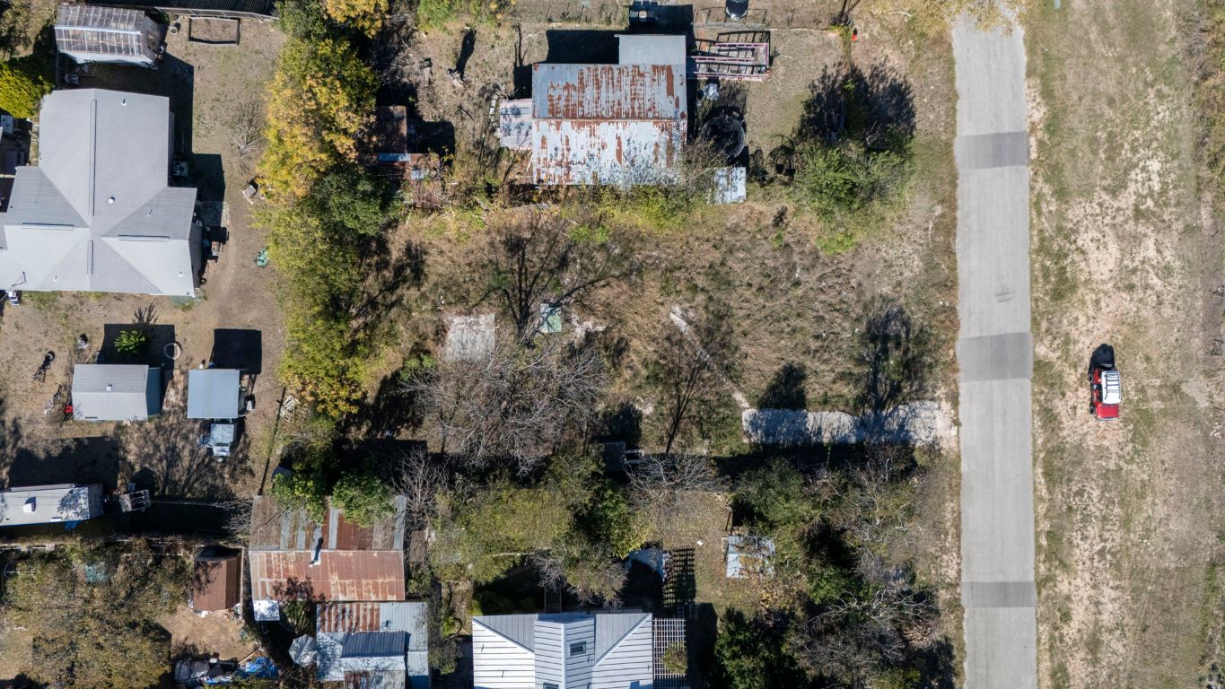 313 North Front Street Kyle, TX 78640 - Photo 18 of 28 an aerial view of residential house with outdoor space