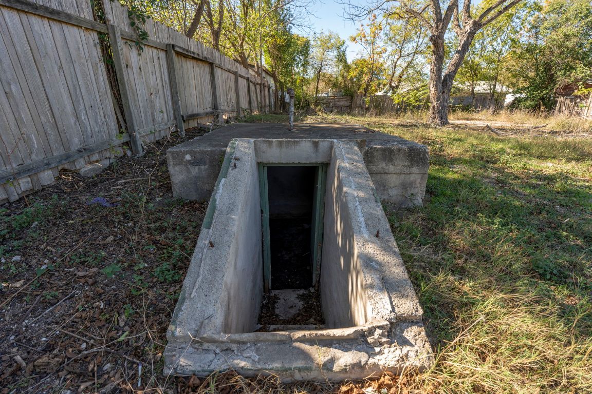 313 North Front Street Kyle, TX 78640 - Photo 24 of 28 a front view of a house with a yard
