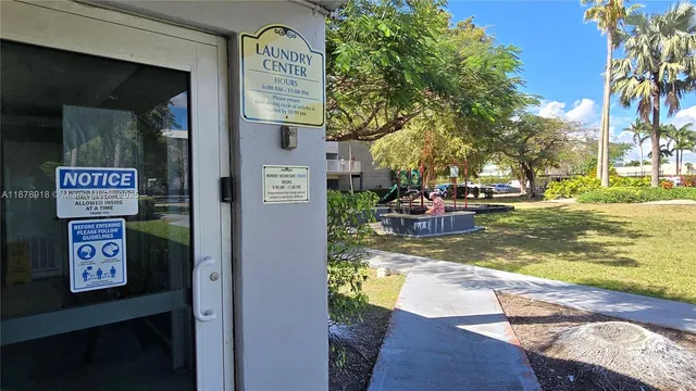 a view of swimming pool with outdoor seating