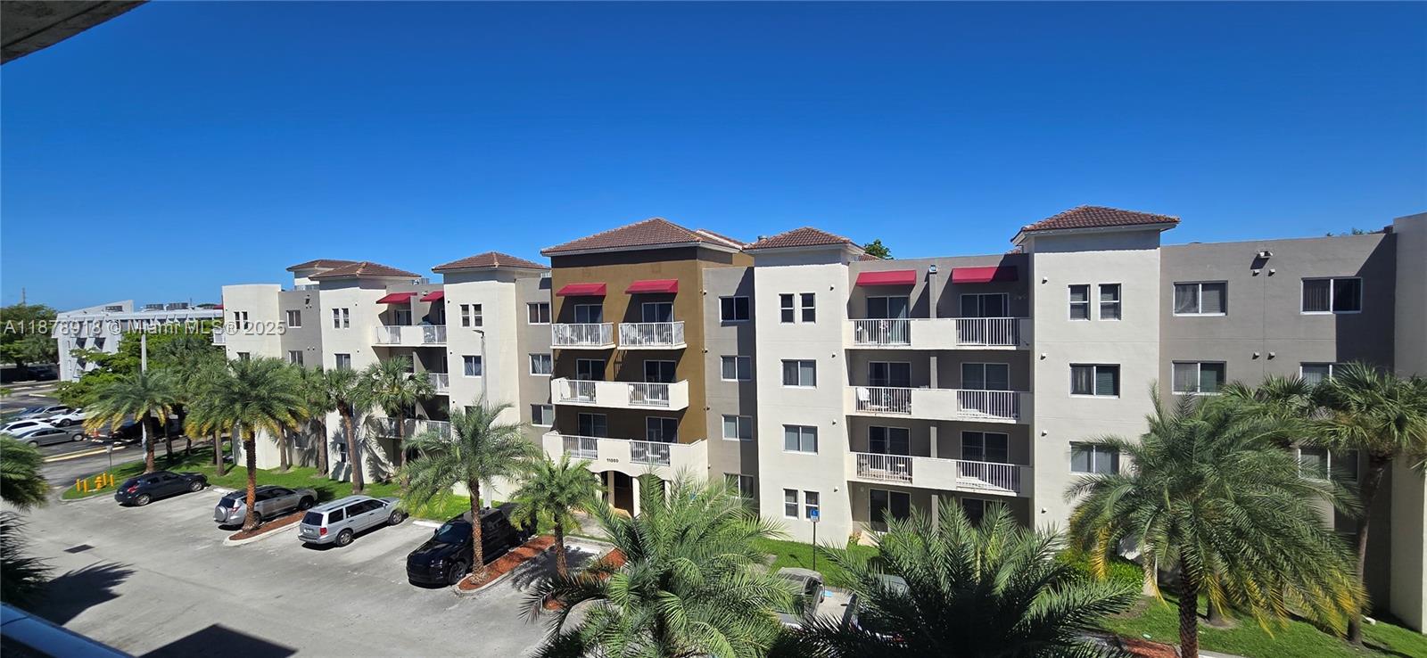11060 Southwest 196th Street, Unit 401 Cutler Bay, FL 33157 - Photo 6 of 17 a front view of a multi story building