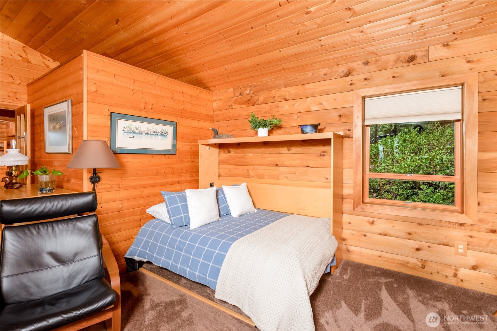 214 Cougar Crest Road Sequim, WA 98382 - Photo 11 of 30 a bedroom with a bed and two windows