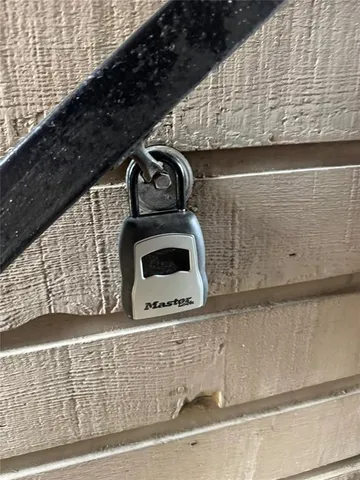 an aerial view of residential house with parking space