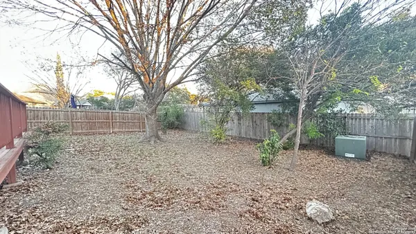 a backyard of a house with seating space