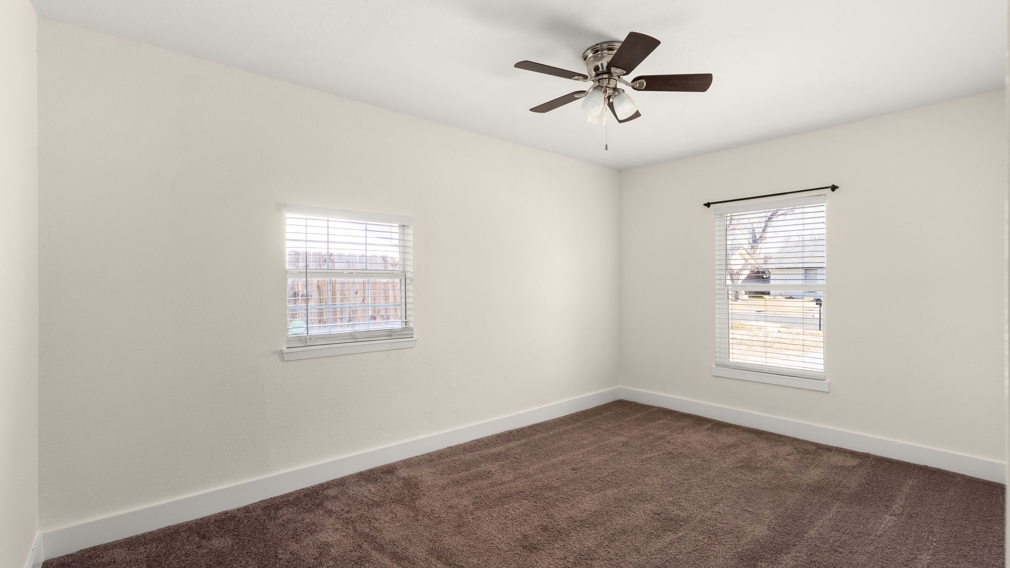 1618 Chippeway Lane Austin, TX 78745 - Photo 26 of 39 Largest bedroom / Primary with full bathroom. Bedroom 3(garage space converted to primary bedroom/2nd living room )