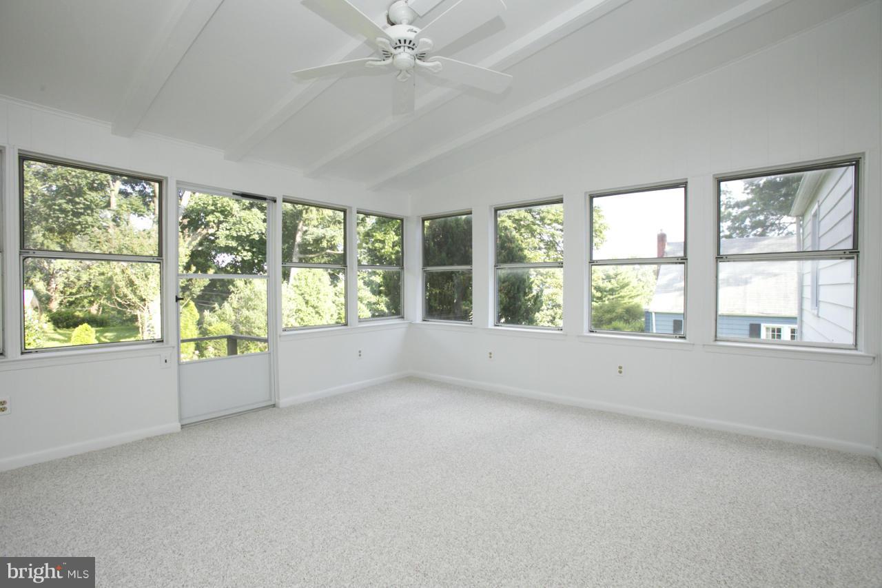 6503 Old Orchard Road Baltimore, MD 21239 - Photo 11 of 26 Kitchen opens to Sunroom Addition