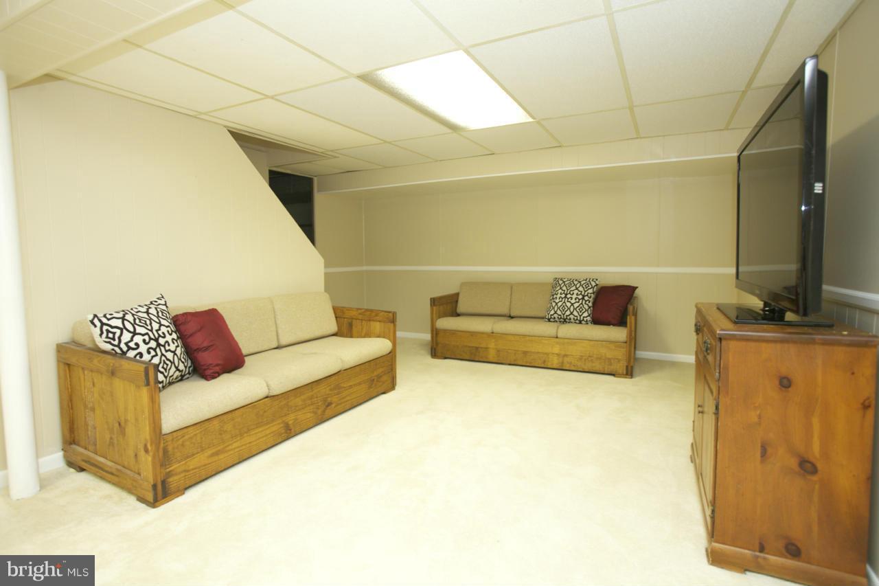 6503 Old Orchard Road Baltimore, MD 21239 - Photo 17 of 26 Finished Recreation Room