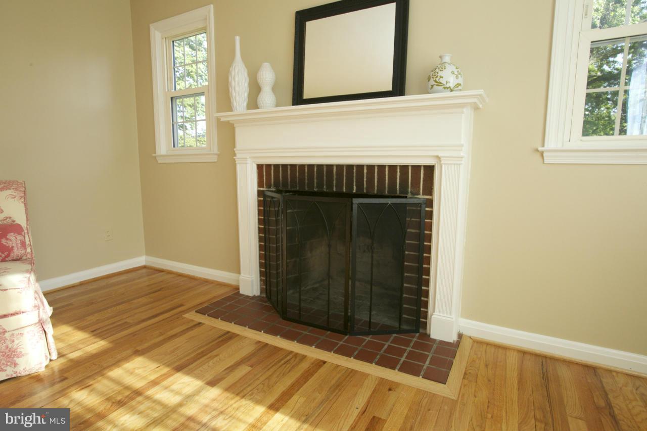 6503 Old Orchard Road Baltimore, MD 21239 - Photo 6 of 26 Woodburning Fireplace ready for the holidays!