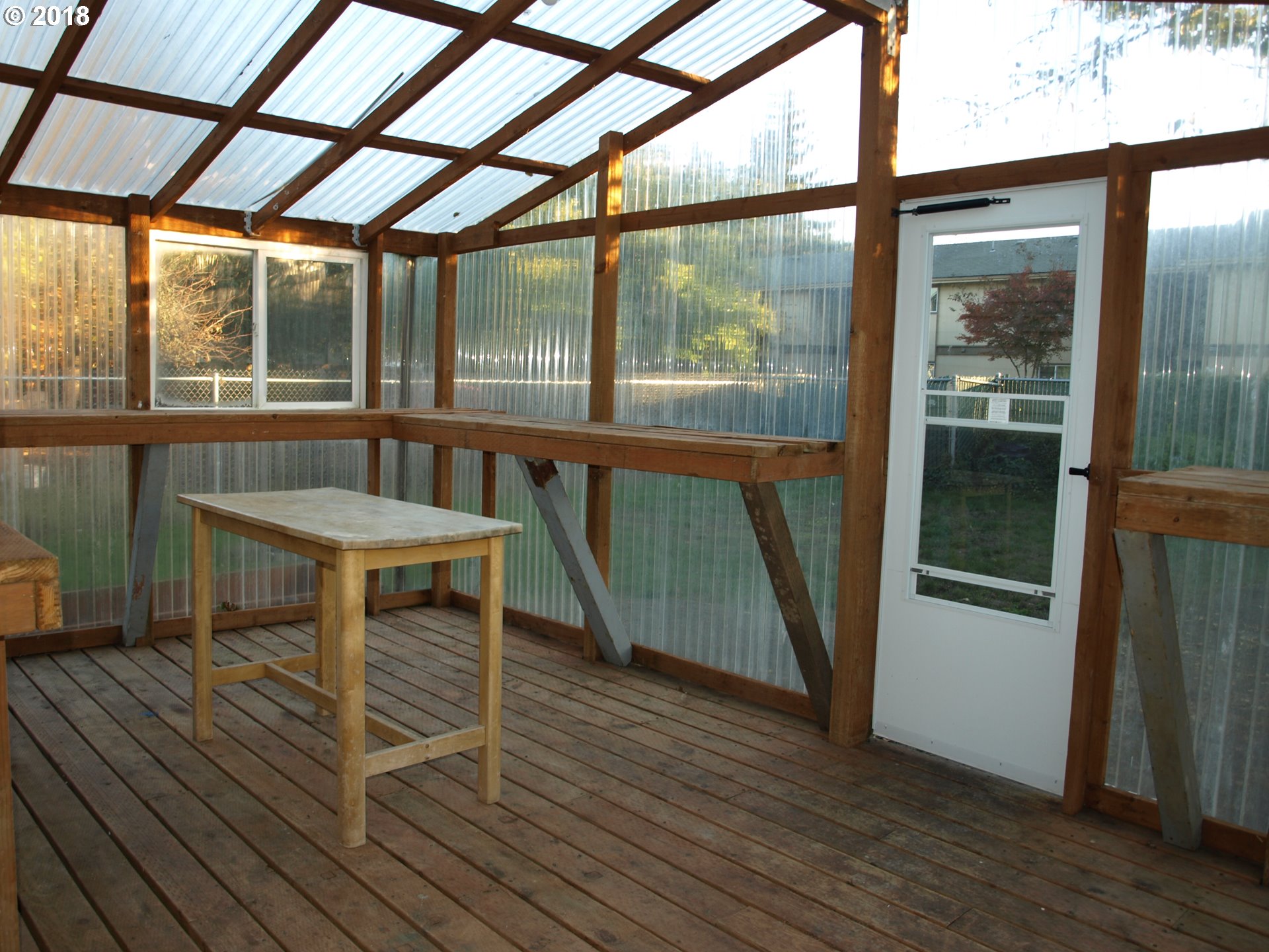 661 West M Street Springfield, OR 97477 - Photo 11 of 13 a dining room with furniture and wooden floor