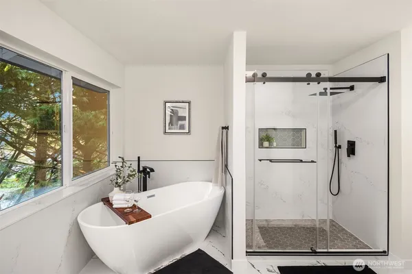 a view of a bathtub in a bathroom