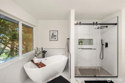 a view of a bathtub in a bathroom