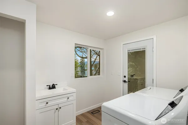 a room with a bed and a window