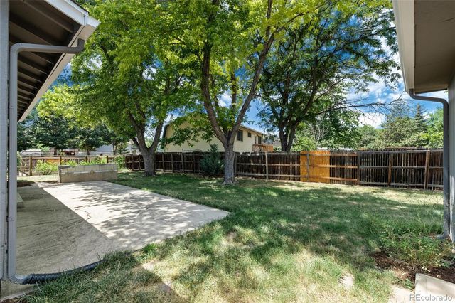 a view of backyard with green space